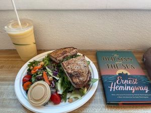 Peaceful Temph and banana mango smoothie. Book not included.  at Sugar Apple Organic Cafe in Key West