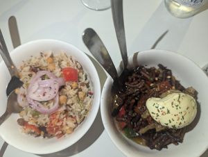 Vegan Briani and pasta with vegetables at La Goma in Granada