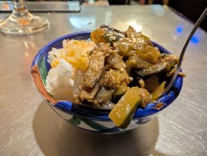 Delicious Asian eggplant with rice at La Goma in Granada
