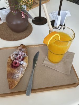  Vegan croissant + orange juice  at Dulce de Leche - Boutique Ruzafa in Valencia
