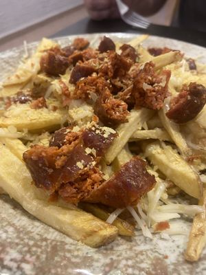 Patatas fritas con chorizo de Heura (bonus points por ponerle levadura nutricional!)  at Batoi Cafe Bar in San Vicente Del Raspeig