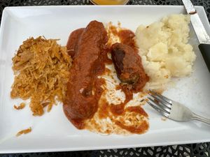 Vegan curry sausage with sauerkraut and wonderful potato salad  at The German Knodle in St Petersburg