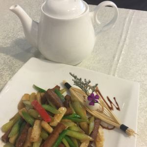 beef Tenderloin, water chestnuts & Cabbage Mustard at Bowei Tang in Beijing