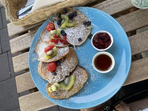 Average pancakes after 50 minutes of waiting. Underside on 1 is completely burnt. at Cytat Cafè in Krakow