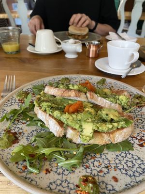 Avocado lox sourdough (with sausage & scrambled tofu bap in the background)  at Beck Hall in Malham