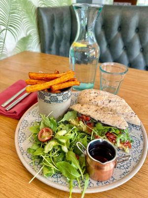 Avocado, tapenade and sundried tomato baguette with sweet potato wedges & salad and vinegar for my chips😄 at Beck Hall in Malham