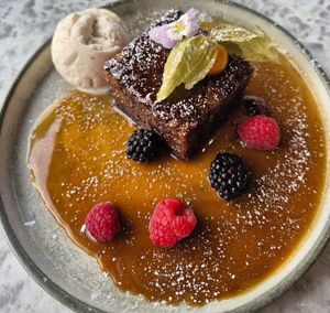 Sticky toffee pudding with creamy ice cream....wow! Yummo! 😋👍🌱 at Beck Hall in Malham