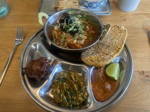 Tikka Masala with Aubergine & Tofu (Top), Cauliflower Pakora (Left), Dhal (Middle), Lime Pickle (Right), Chili Flatbread (Top Right)  at Beck Hall in Malham