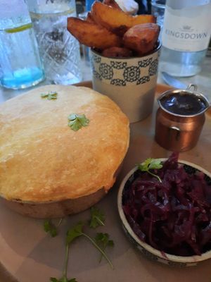 Plant 'beef' Guinness Pot Pie with potato wedges and real gravy (large portion!) at Beck Hall in Malham