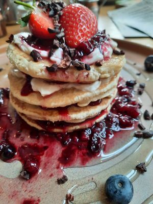 American pancakes with Berry compote, oat yogurt and agave syrup at Beck Hall in Malham