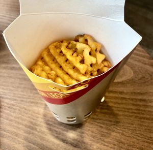 Waffle fries  at LEON - Manchester Piccadilly in Manchester