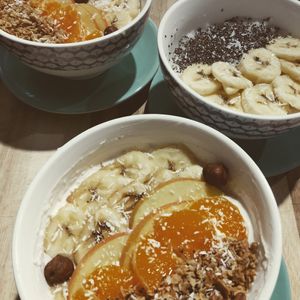 Vegan overnight oats with handmade granola(front and back) and coconut rice pudding (centre) at Cafe Isla in Stuttgart