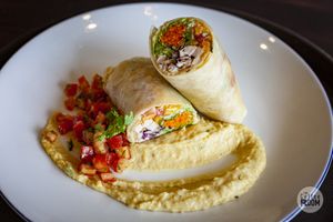Burrito with tomatoes and homemade Humus  at The Coffee Room in Koh Samui