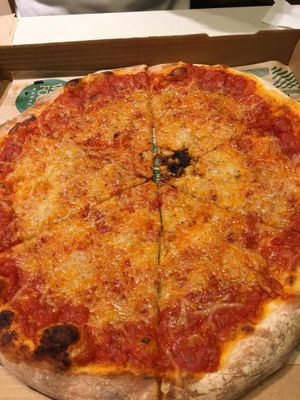 Vegan pizza upon request: tomato sauce and Daiya pepper jack cheese  at Whole Foods Market - Cambie in Vancouver