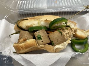 One bite less of the banh mi!  at Sunflower Bakehouse in Nashville