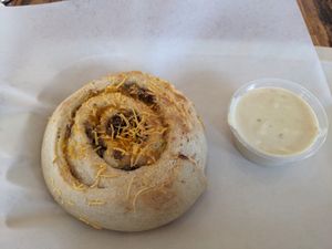 Sausage roll (w/ cheese sauce, recommended over the gravy) at Sunflower Bakehouse in Nashville