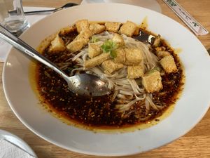 Vegan soup pot with noodles, tofu and vegetables at Szechuan Impression in Linz