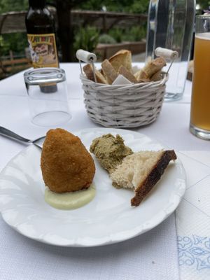 Hummus patty, rice with tomato and pees in deep fry  at Fattoria la Capra Campa in Acqui Terme