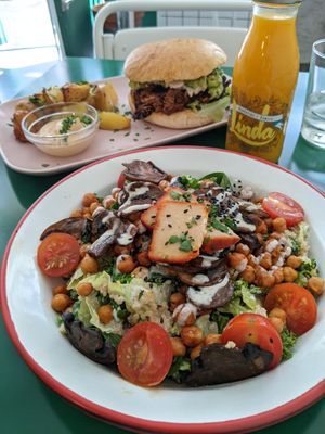 Ceasar salad and burger at Romero Verde in Madrid