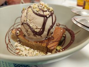 Dessert / pistachio cake with ice cream at Romero Verde in Madrid