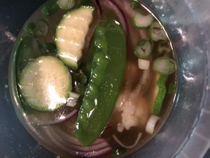 Vegan pho soup base  at The Rolling Spring Roll in Farmingdale