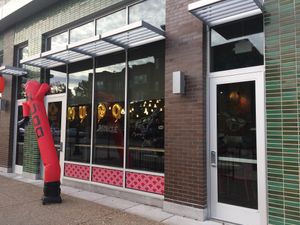 Restaurant front. Not sure if wasn’t inflatable arm guy will stay or if he’s just for their grand opening. at Nudo House in St Louis