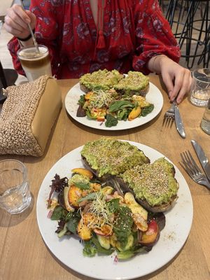 Avo toast and iced latte with oat milk.  at Virgule in Toulouse
