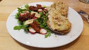 Hummus toast and salad at Virgule in Toulouse