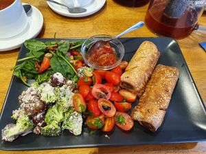 Caramelised onion shroomdogs, three salads and a chutney. The tea was delicious, mango. at Sage Cafe in Lancaster