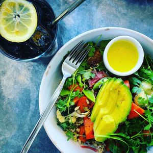 HARVEST BOWL: warm super grains, purple yam, radishes, cauliflower, carrot, summer squash, avocado, pickled onion, sunflower, pumpkin and chia seeds, with turmeric-ginger sauce at Wildseed in San Francisco