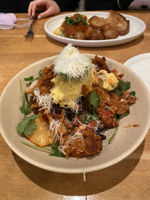 Chilaquiles with omelette in back ground  #Veganuary at Wildseed in San Francisco