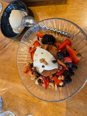 Citrus Almond Cake with Coconut 🥥 Cream and fresh berries at Wildseed in San Francisco