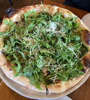 Green Forest pizza - chimichurri, broccolini, mushrooms, smoked cashew mozzarella, arugula at Wildseed in San Francisco