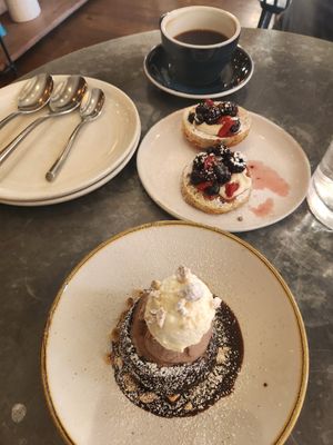 Lemon poppyseed cake with whipped cream and berries (top) and chocolate cake filled with mousse and topped with chocolate ice cream and whipped cream....both highly reccomended at Wildseed in San Francisco