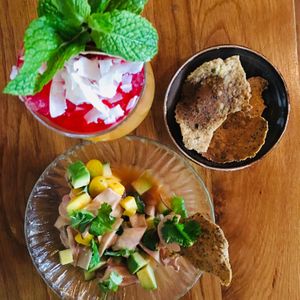 Ceviche of King Trumpet Mushroom, leche de tigre, avocado, mango and seeded chips. Stinson Beach (passion fruit, coconut water, lemongrass, ginger, lime, hibiscus)  at Wildseed in San Francisco