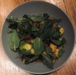 Roasted brussels sprouts:
citrus-soy glaze, calabrian chilies, mint, thai basil at Wildseed in San Francisco