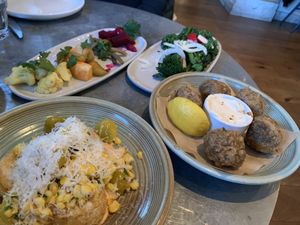 Mexican corn cakes, veggies on back, mushroom fritters on right   at Wildseed in San Francisco