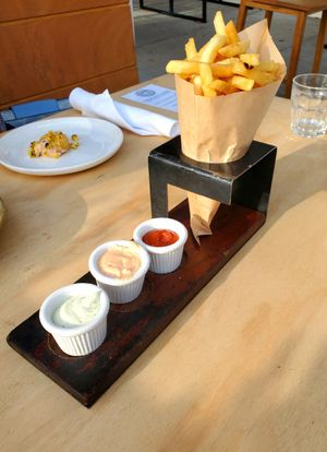 Belga fries with herb aioli, chipotle aioli, curry ketchup at Wildseed in San Francisco