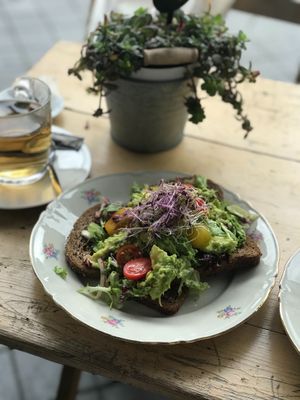 Avocado toast with cherry tomatoes and sprouds. It was delicious, very nice and helpfull staff.  at Gasterij de Koffiemolen in Valkenburg
