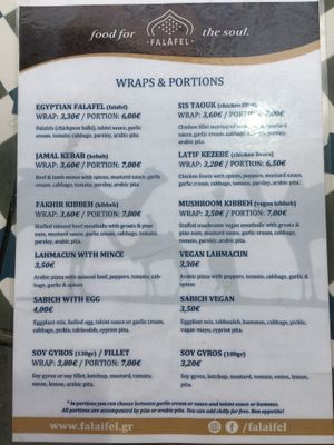 menu in english: wrap is as filling as a portion which is a plate dish, i recommend the wrap!  at Falaifel in Thessaloniki