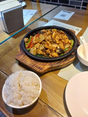 Vegetarian three cup chicken on a sizzling plate at Jing Lian Zhai - Hepingli in Beijing
