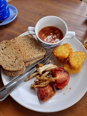Vegetarian breakfast,  made vegan by swapping eggs for more hash browns at 89 Cafe in Krabi