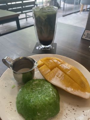 matcha latte with oat milk and espresso, and mango and pandan sticky rice  at The Coffee Club in Bangkok