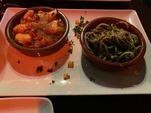 White beans with onion, pesto zucchini ribbons at Bodega Biarritz 1881 in Barcelona