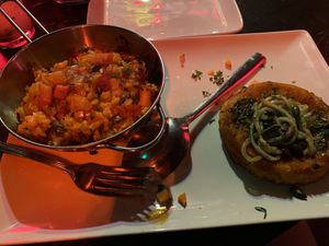 Rice with veg, pastry with tomato and pesto zucchini ribbons. at Bodega Biarritz 1881 in Barcelona