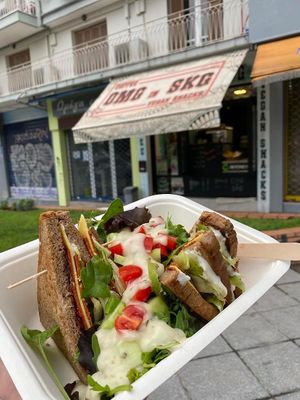 Vegan club sandwich with salad. Meat choice - chorizo. Garlic mayo and sweet pepper chutney for toppings.  at OMG in SKG in Thessaloniki