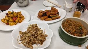 Kung pow 'chicken' (tofu), spare 'ribs'(lotus root), sesame cabbage and stir fried rice at Gongdelin Vegetarian Restaurant in Beijing