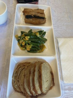 Baby courgette, mock fish tasted of the sea   at Gongdelin Vegetarian Restaurant in Beijing