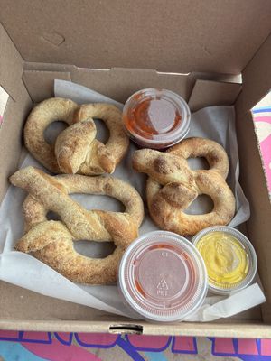 Half order of vegan pretzels with mustard. And 2 sides of tomato sauce.  at Mellow Mushroom in Branson