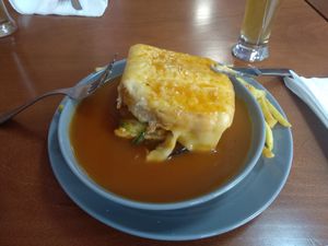 Francesinha, after i took a bite. :) at Prema in Viseu